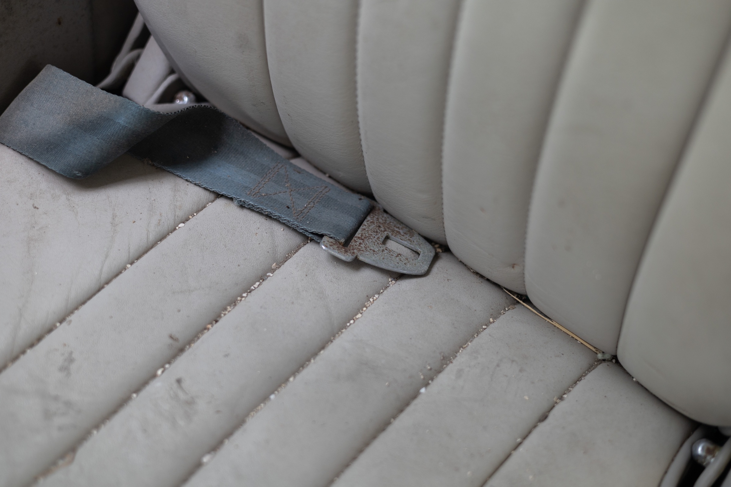Corroded aircraft seatbelt exposed to tropical weather