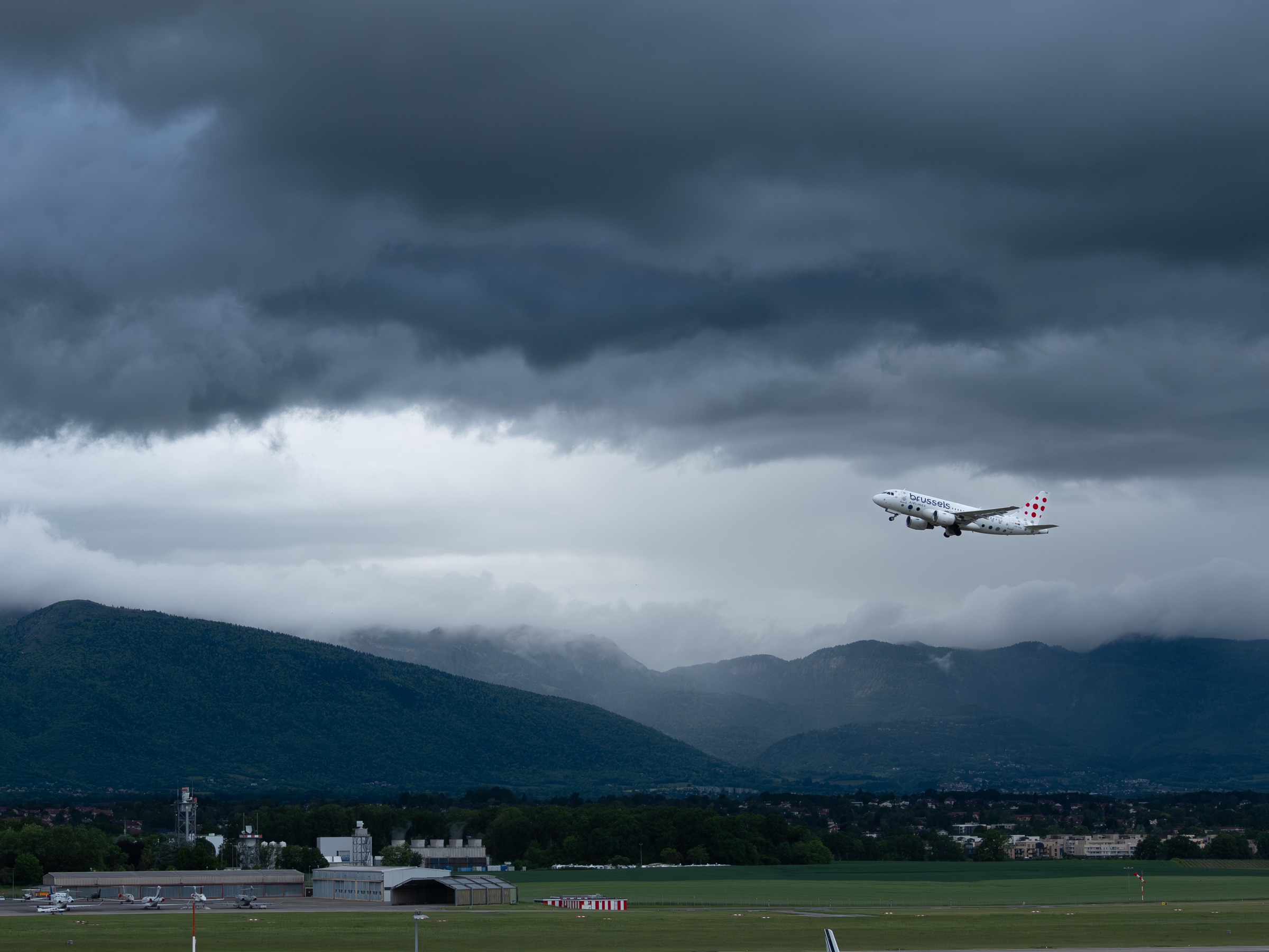Airplane photographed in the sky over Geneva